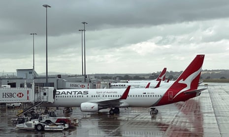 This picture taken on February 22, 2021 shows Qantas planes lined up at Melbourne's international airport.