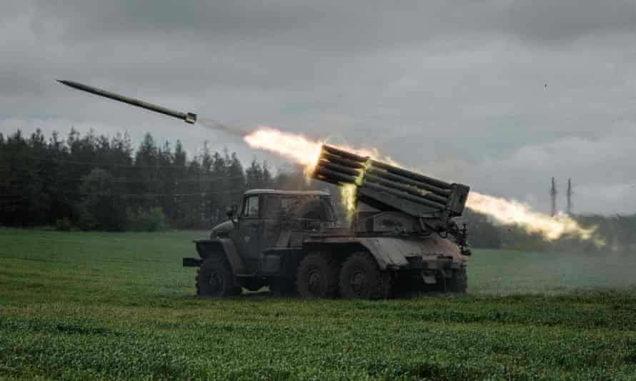 A rocket is launched from a truck-mounted multiple rocket launcher near Svyatohirsk, eastern Ukraine