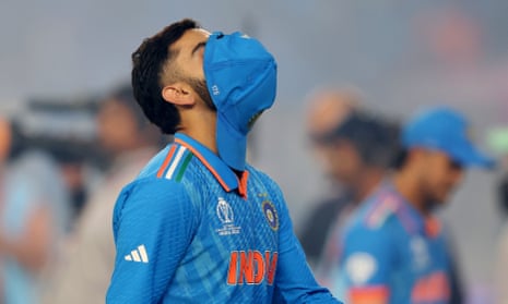 Virat Kohli cuts a dejected figure following the ICC Men's Cricket World Cup final between India and Australia.