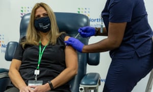 Nurse Elyse Isopo receives Covid-19 Pfizer vaccine booster at Teaching Center LIJ Medical Center. The CDC recommended boosters for people older than 65, between 18-65 at risk of severe Covid-19, and for people who work in frontline occupations such as healthcare providers.