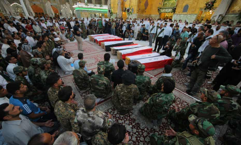 Coffins of 10 Iraqi soldiers killed in June 2014 by Islamic State militants