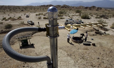 An antenna to send data stands on a rise above an earthquake monitoring well, right, powered by a solar electric panel, lower left, as scientists from the US Geological Survey set up an earthquake monitoring station on the San Andreas fault.