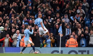 Vincent Kompany celebrates his superb long-range strike that beat Leicester