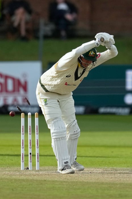 Matt Renshaw is bowled out, bails flying off the stumps behind him