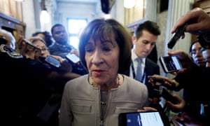 Susan Collins talks with reporters after announcing her vote to confirm Brett Kavanaugh, in October 2018.