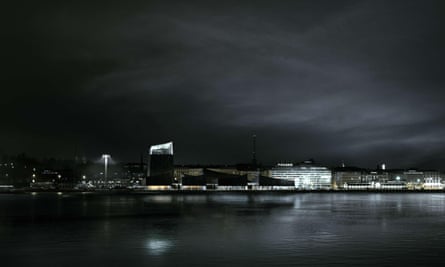 A computer-generated night view of the Helsinki Guggenheim.