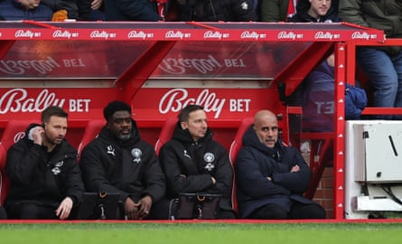 James French, Kolo Touré, Pep Lijnders and Pep Guardiola in the Manchester City dugout at Nottingham Forest.