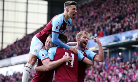 Chris Wood (no 11) is congratulated by his teammates as they celebrate after he scored his, and Burnley’s, second goal of the game.