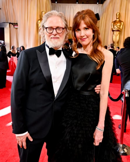 Tony McNamara and his wife, Belinda Bromilow, at the 2024 Oscars.