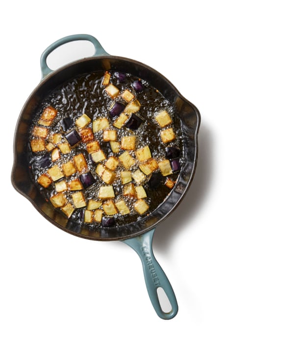 frying aubergine – eggplant – and courgette for Felicity Cloake’s caponata.
