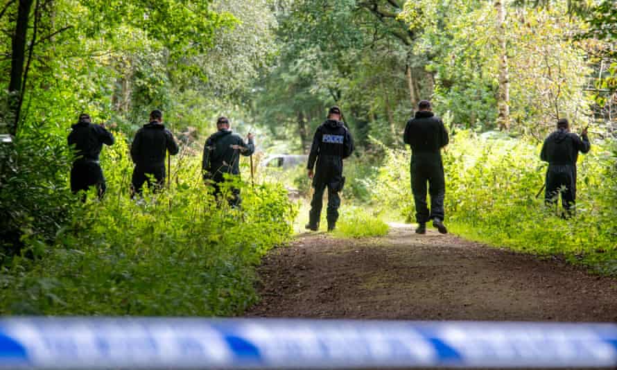 Police officers search land at Sand Hutton gravel pits on Tuesday
