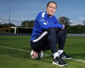 Lucy Bronze holds a football