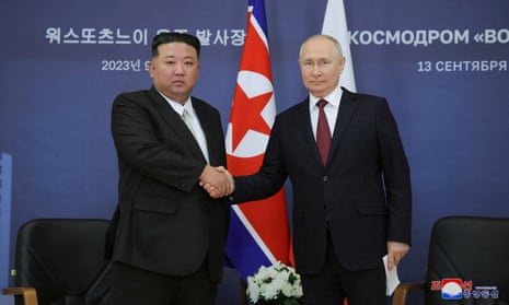 North Korea's leader Kim Jong-un shaking hands with Russia's President Vladimir Putin during their meeting at the Vostochny Cosmodrome in Russia's Amur region. 