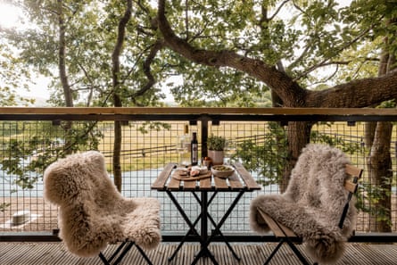 Platform with furry chairs in a tree