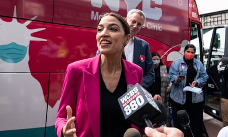 Representative Alexandria Ocasio-Cortez visited a mobile vaccine bus on Castle Hill Avenue in the Bronx to encourage people to get the jab.