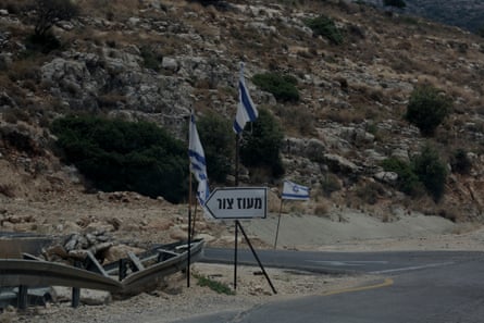 A sign that marks the new paved road to the illegal outpost of Neve Tzur in the West Bank, many of the attack in the villages nearby and the aproation of lands and houses are from settlers from this outpost.