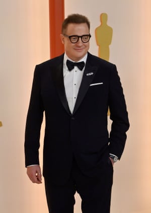Star of The Whale, Brendan Fraser, was an early arrival on the champagne carpet. He went for a foolproof Giorgio Armani tuxedo, an as yet unidentified pin on his lapel and a little linen hankie in his pocket.