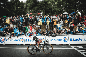 Stage 16 Pas De La Case to Saint-GaudensBora–Hansgrohe rider Patrick Konrad celebrates as he approaches the finish line