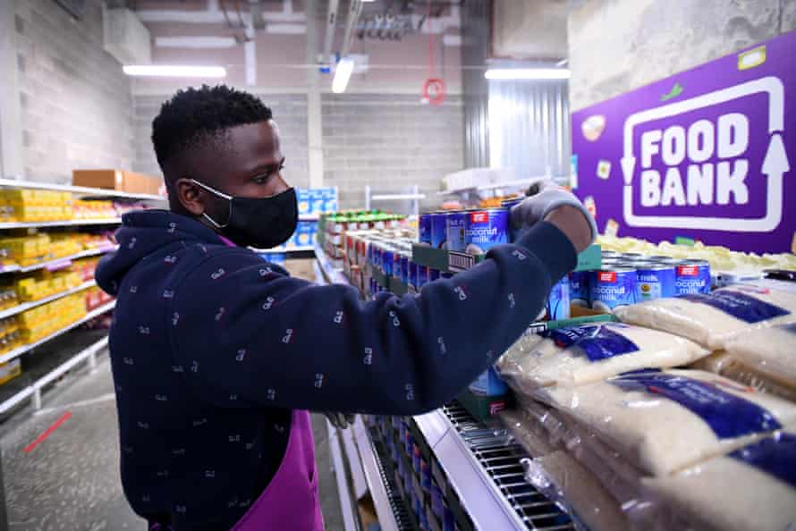 Volunteer Djafari Mwarabu is seen at work at the Food Bank pop-up store in Melbourne.