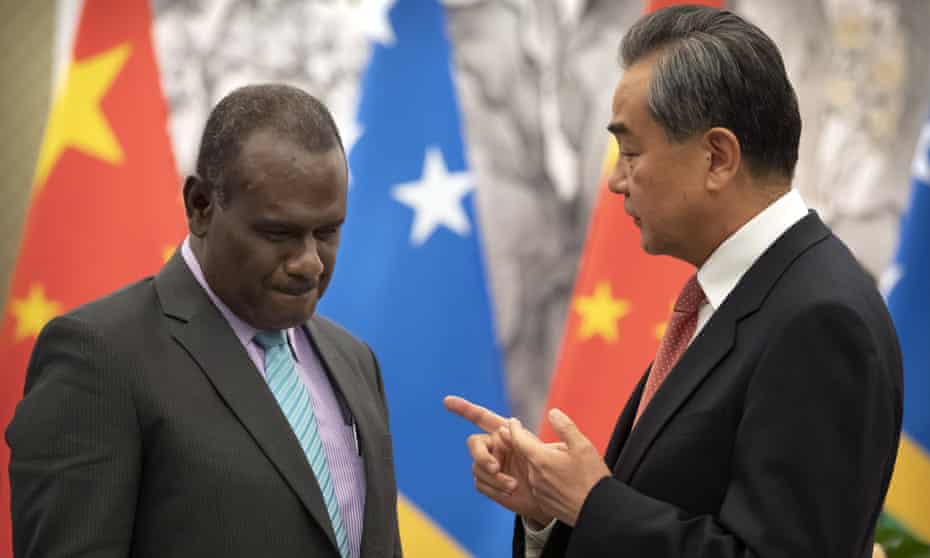 Solomon Islands foreign minister Jeremiah Manele, left, and Chinese foreign minister Wang Yi in Beijing in 2019.