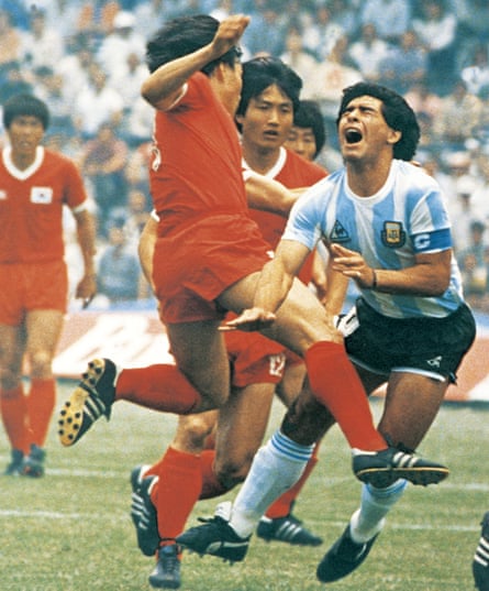 Diego Maradona takes a 'terrifying' kick to a knee from South Korea's Huh Jung-moo.