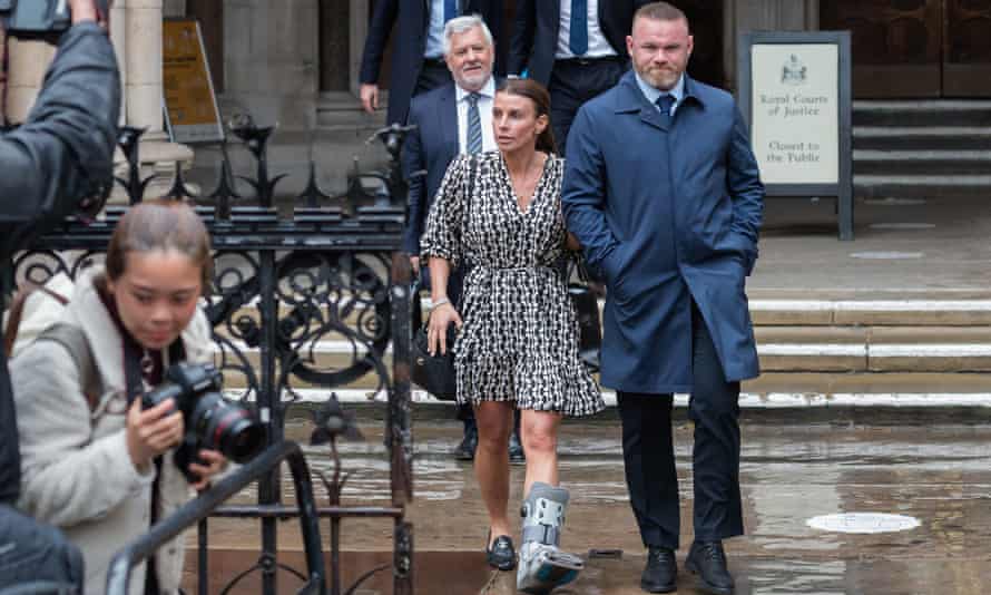 Coleen Rooney an husband Wayne leave the court on Wedensday.