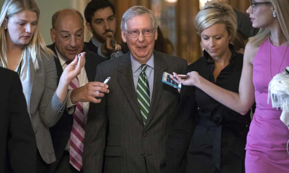 Senate Majority leader Mitch McConnell leaves the chamber after announcing the release of the Republicans’ healthcare bill.