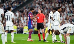 Lamine Yamal speaks to the referee during Barcelona’s La Liga loss to Real Madrid at the Bernabéu on Sunday