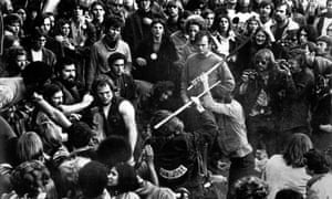 Hell Angels attacking Rolling Stones fans at the Altamont music festival.