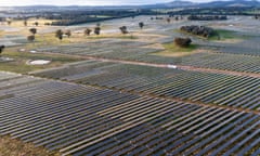 Solar panel farm at sunrise in rural Australia.