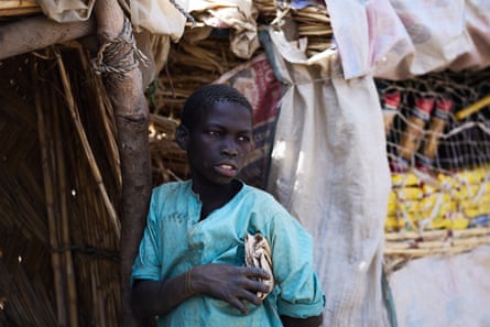 A young boy in the mining town of Nahuta, which has been targeted by armed gangs.