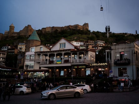 A Ukrainian flag displayed over a business in central Tbilisi.