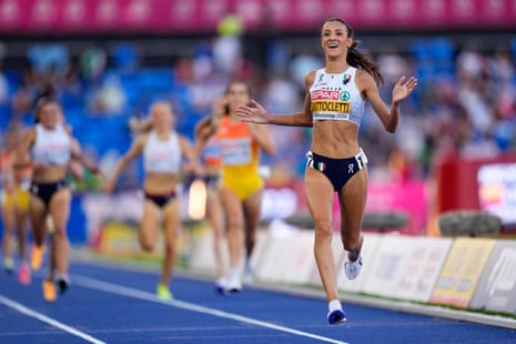 Nadia Battocletti celebrates after winning the gold medal in the women's 5,000m final.
