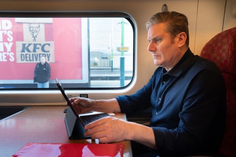 Keir Starmer on a train to Birmingham today.