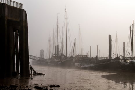 Magical monochrome morning fog on the River Thames at Hermitage Community Moorings, Wapping.