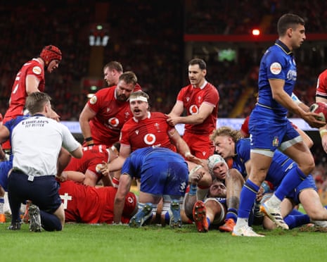 Wainwright of Wales scores a try.
