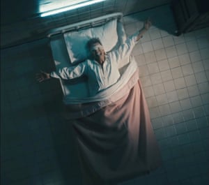 David Bowie blindfolded in a hospital bed in a still from his new single Lazarus