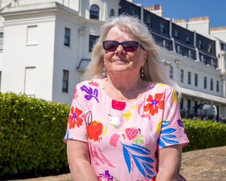 Carol sitting near the seafront
