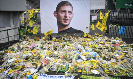 Flowers are laid in front of a portrait of Argentinian forward Emiliano Sala at a makeshift memorial at the Beaujoire stadium in Nantes, November, 2021.