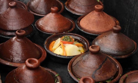 Tagines lined up, ready for lunch, at Terrasse Bakchich, Marrakech, Morocco.