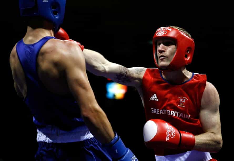 Tony Jeffries (right) in action against Kenny Egan at the Beijing Olympics in 2008. Now a gym-owner, he estimates he was punched in the head between 40,000 and 50,000 times during his boxing career.