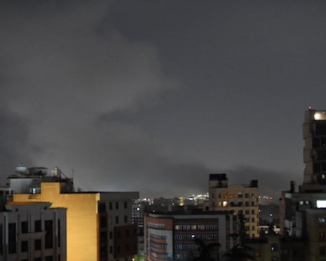 Smoke billows after explosions in Tehran, Iran, on Monday morning