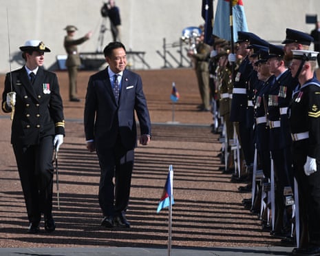 Thai Prime Minister Anutin Charnvirakul inspects a guard of honour during a ceremonial welcome outside Parliament House.