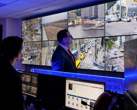 Matt McCool, US Secret Service special agent in charge (center), looks at live video surveillance feeds in Brooklyn, New York, on Monday.