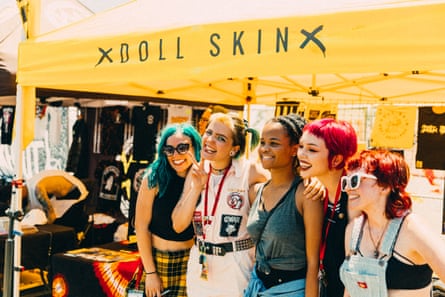 ‘Raw and feminine and powerful’ ... Members of Doll Skin pose with fans.
