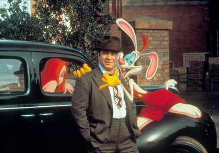 Jessica Rabbit (voiced by Kathleen Turner) Bob Hoskins as Eddie Valiant and Roger Rabbit (voiced by Charles Fleischer) in Who Framed Roger Rabbit.