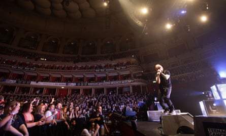 Ed Sheeran performing on stage during the Teenage Cancer Trust series of charity gigs, at the Royal Albert Hall, in London.