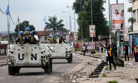 Peacekeepers patrol the streets of Kinshasa during demonstrations against President Kabila