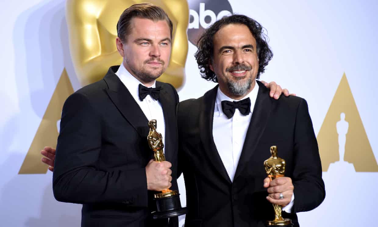 ‘What was your question?’ … Leonardo DiCaprio, left, with The Revenant director Alejandro González Iñárritu, responding to a reporter at the Oscars press conference.