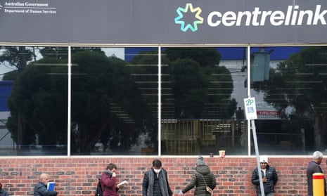 People queue outside a Centrelink office